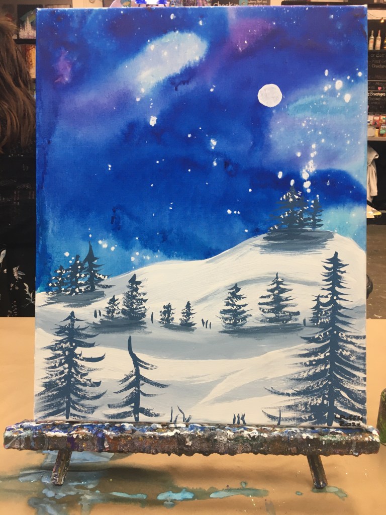 Acrylic painting of pine trees on snowy hills with a purplish blue night sky and a full moon