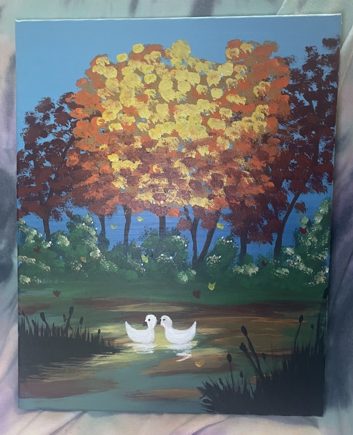 Acrylic painting of fall trees with yellow and orange leaves behind a hidden pond with two white ducks (which were supposed to be swans)